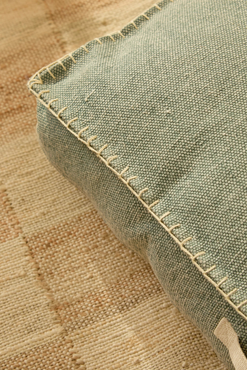 Cama para perro turquesa desenfundable detalle cosido